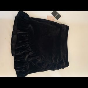 Black velvet material skirt